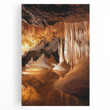 Stretched canvas artwork depicting a vibrant landscape scene with intricate cave formations, showcasing rich colors and detailed textures, ideal for home decor.