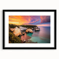 Black-framed landscape artwork featuring dramatic cliffs and a serene sky, elegantly matted to enhance visual appeal, ideal for modern home decor.