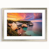 Framed landscape artwork of majestic cliffs, encased in a sleek silver mat, highlighting natural beauty and depth, perfect for elegant home décor.