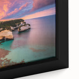 Close-up of a framed canvas showcasing a vibrant landscape featuring rugged cliffs, lush greenery, and a dramatic sky, perfect for home decor or art enthusiasts.