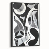 Abstract geometric framed canvas artwork showcasing a sleek black design with sharp angles and modern aesthetics, ideal for contemporary home decor. Perfect for adding a stylish touch to living spaces or offices.