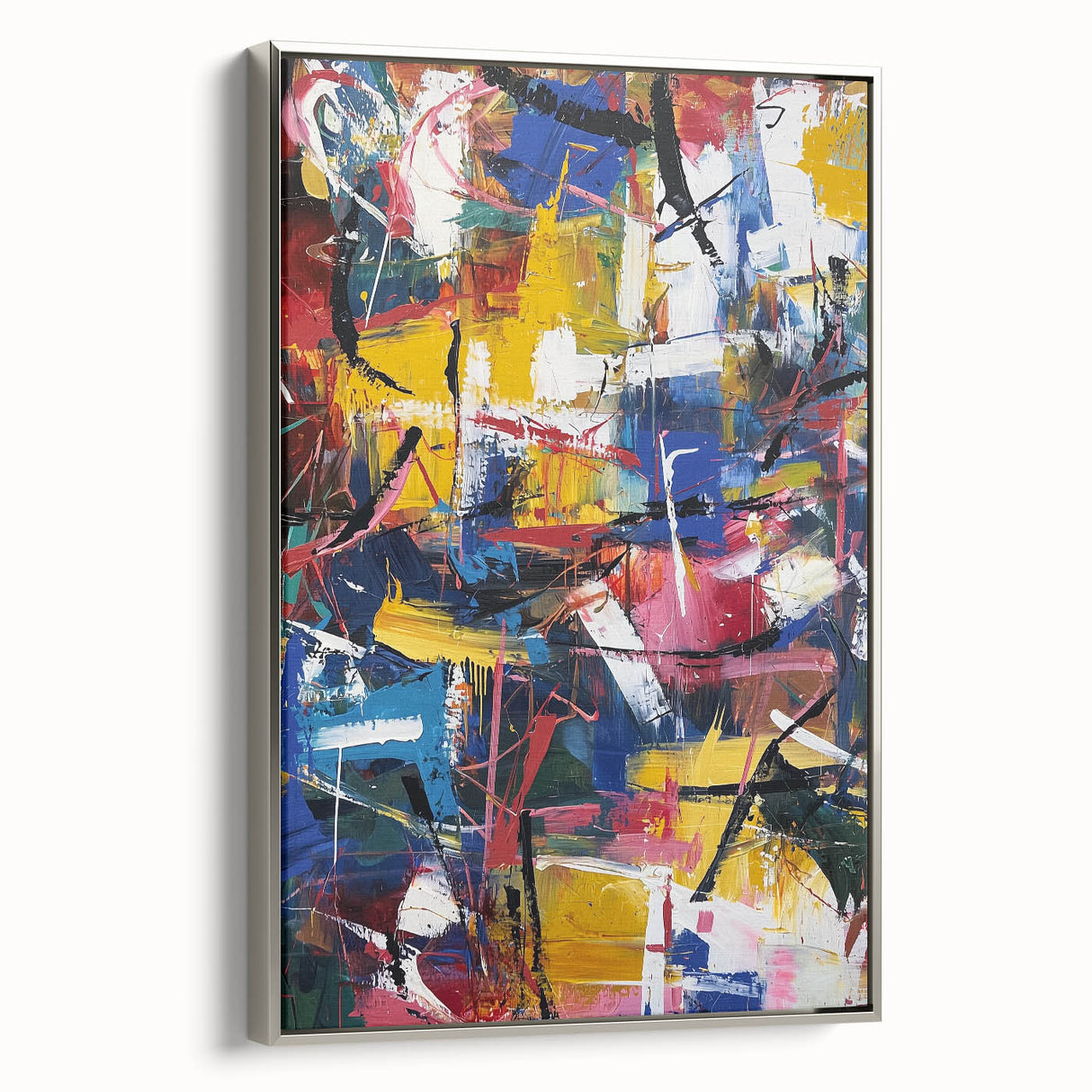 Framed abstract canvas print showcasing vibrant splatter designs in silver frame, positioned at an angle to highlight its artistic texture and contemporary style.