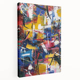 Abstract splatter art canvas with vibrant blue, yellow, and red colors, showcasing a dynamic design; perfect for modern home decor and artistic expression.