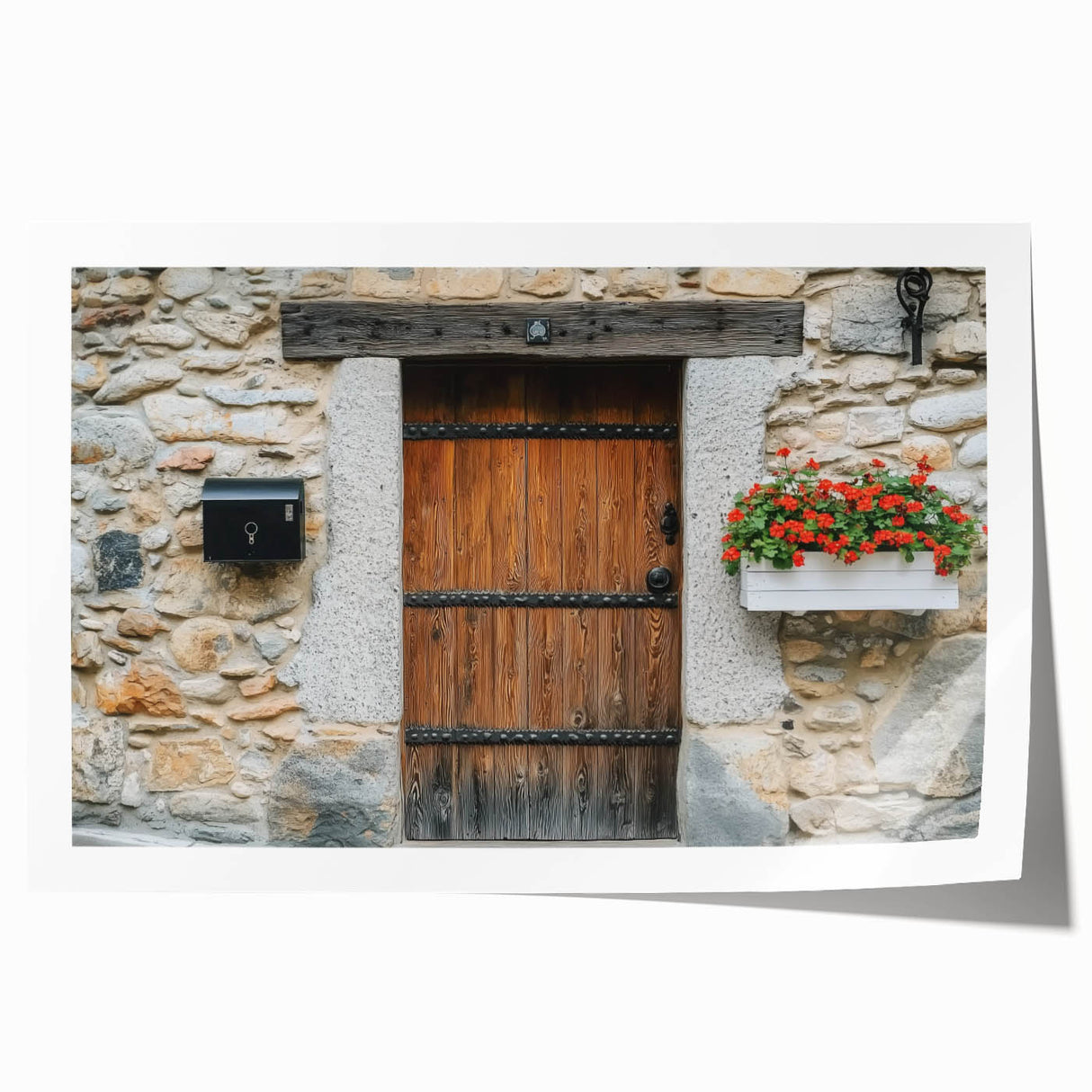 Rolled landscape print of a rustic barn set against a vibrant blue sky, showcasing intricate details and textures, perfect for farmhouse decor or country-themed interiors.