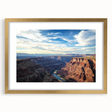 Framed landscape artwork depicting stunning canyons, featuring a gold mat and sleek design, ideal for enhancing modern home decor with natural beauty.
