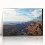 Framed acrylic artwork depicting a vibrant landscape of canyons in warm gold tones, designed to enhance home decor with a modern touch. Ideal for nature lovers.