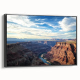 Framed canvas art depicting a stunning landscape of canyons in rich earth tones, showcasing intricate textures and a sleek black frame, ideal for modern decor.