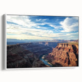 Framed canvas artwork depicting a stunning landscape of canyons in warm earth tones, showcasing intricate details and textures, perfect for home decor.