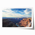 Stunning landscape print showcasing vibrant canyons in rich earth tones, expertly rolled for easy display and shipping, ideal for home decor enthusiasts.