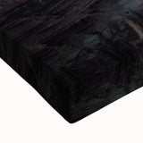 Close-up view of a stretched canvas featuring a vibrant landscape of canyons, showcasing rich earth tones and intricate textures, perfect for home decor.