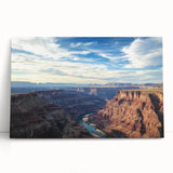 Stretched canvas artwork depicting vibrant canyons in a landscape setting, showcasing rich colors and intricate details, perfect for home decor enhancement.