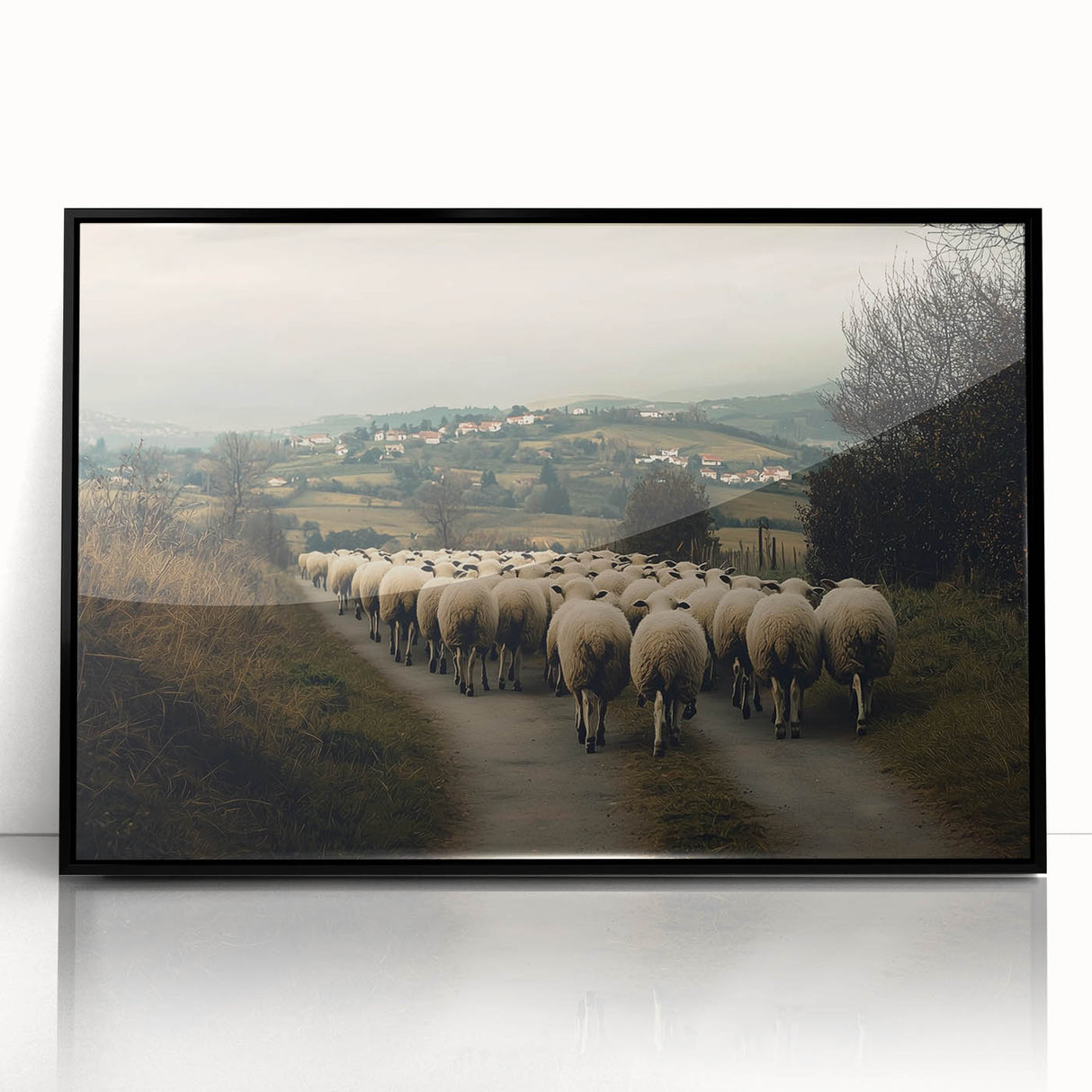 Framed acrylic artwork depicting a serene countryside landscape with lush greenery and rolling hills, set in a sleek black frame, perfect for home decor.