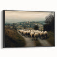 Framed canvas art depicting a serene countryside landscape with vibrant green fields and a bright blue sky, showcasing a black frame and side view angle.
