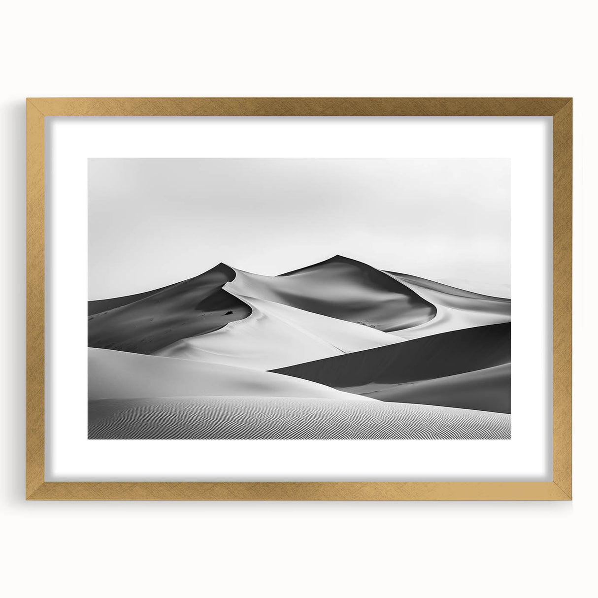 Framed landscape artwork depicting golden sand dunes under a clear blue sky, featuring a gold mat border that enhances the overall elegance and depth.