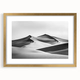 Framed landscape artwork depicting golden sand dunes under a clear blue sky, featuring a gold mat border that enhances the overall elegance and depth.