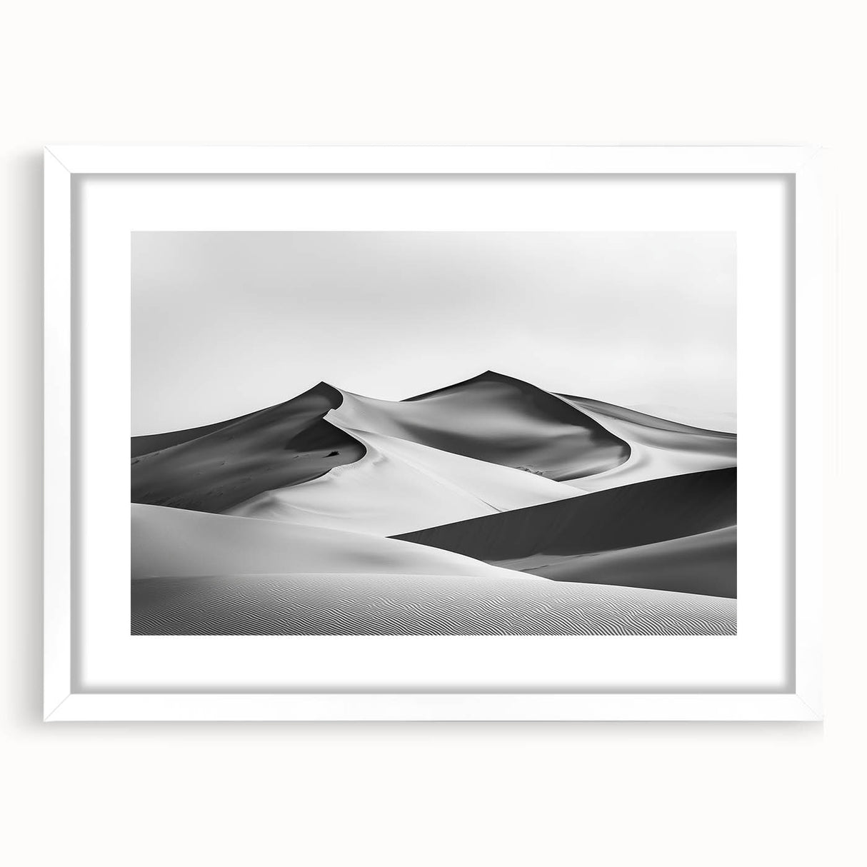 Framed landscape artwork showcasing serene sand dunes in soft beige and golden tones, set in a sleek white mat and frame, ideal for modern home decor.