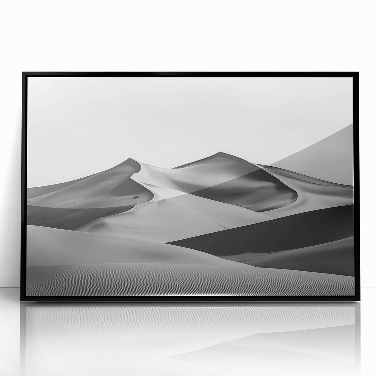 Framed acrylic artwork showcasing a serene desert landscape with golden sand dunes, featuring a sleek black frame, ideal for modern home decor.