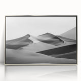 Framed acrylic artwork showcasing serene sand dunes in soft beige and gold tones, designed to elevate any modern living space with its tranquil landscape theme.