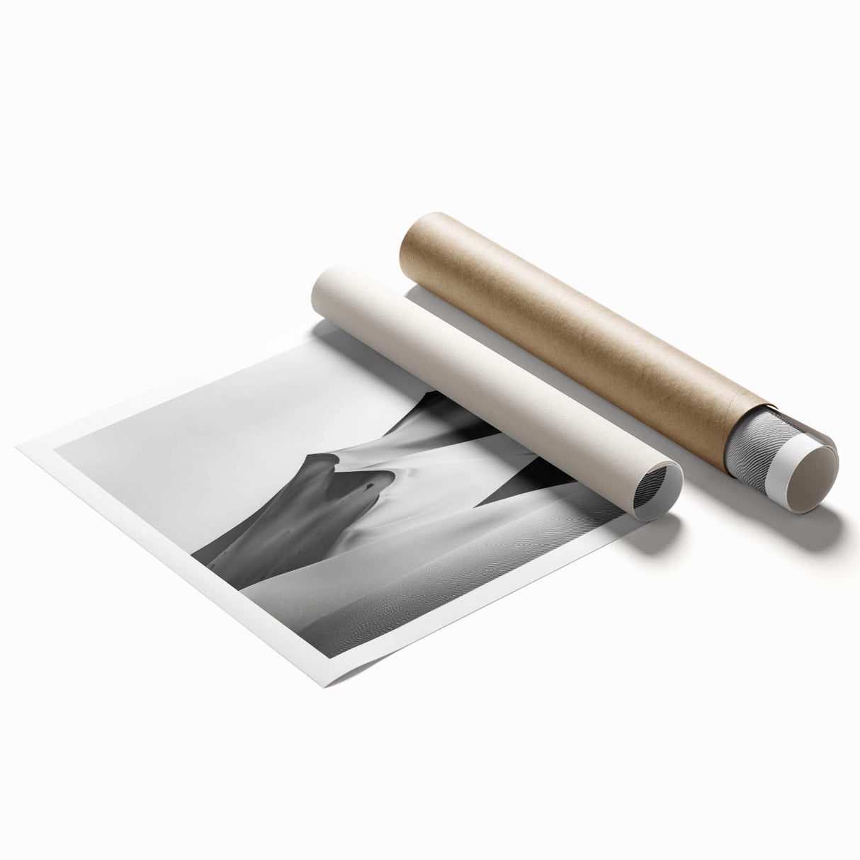 Desert landscape rolled print showcasing undulating sand dunes under a vibrant sunset, packaged securely in a sturdy tube for easy shipping and display.