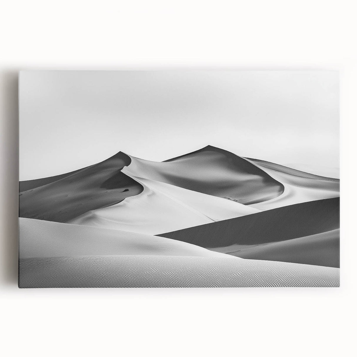 Stretched canvas artwork showcasing a serene landscape of golden dunes under a clear blue sky, perfect for home decor or office ambiance.