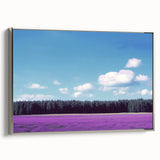 Framed canvas artwork showcasing a serene landscape with expansive fields, set in a sleek silver frame, enhancing any modern decor. Ideal for nature lovers.