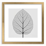Extra large abstract art print featuring close-ups of leaves in textured greens and browns, framed in gold.