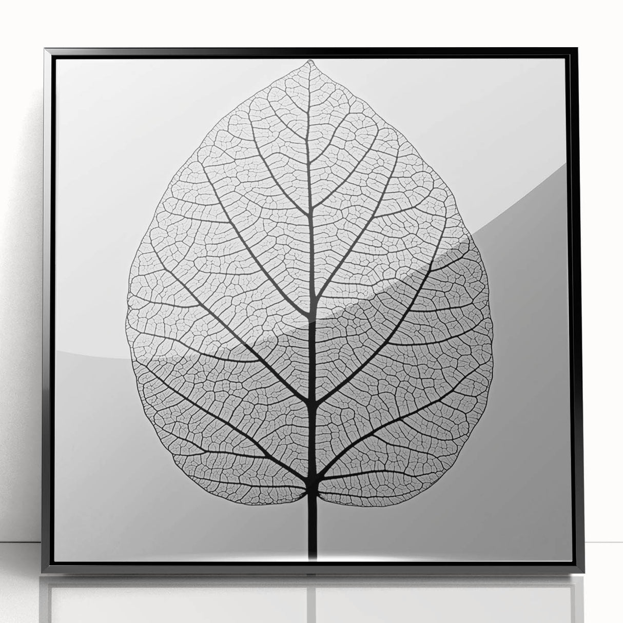 Large abstract wall art featuring close-up leaves in green and black, acrylic print in black frame.