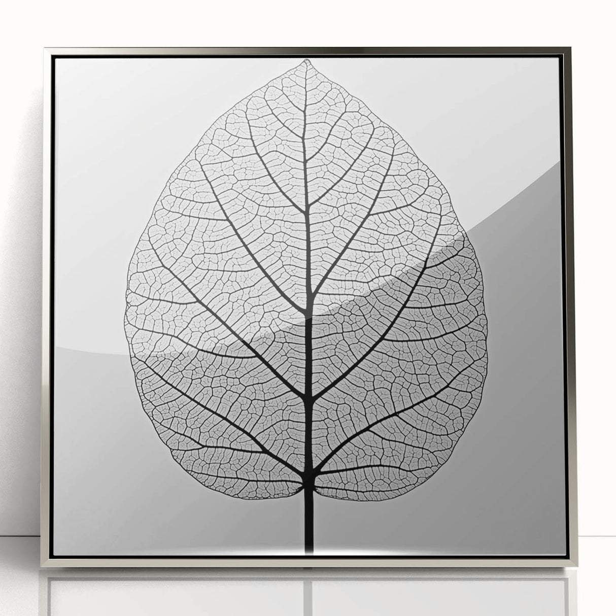 Mid-century modernist art featuring close-up of green leaves in a silver framed acrylic, suitable for nursery wall decor.