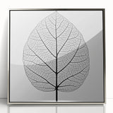 Mid-century modernist art featuring close-up of green leaves in a silver framed acrylic, suitable for nursery wall decor.