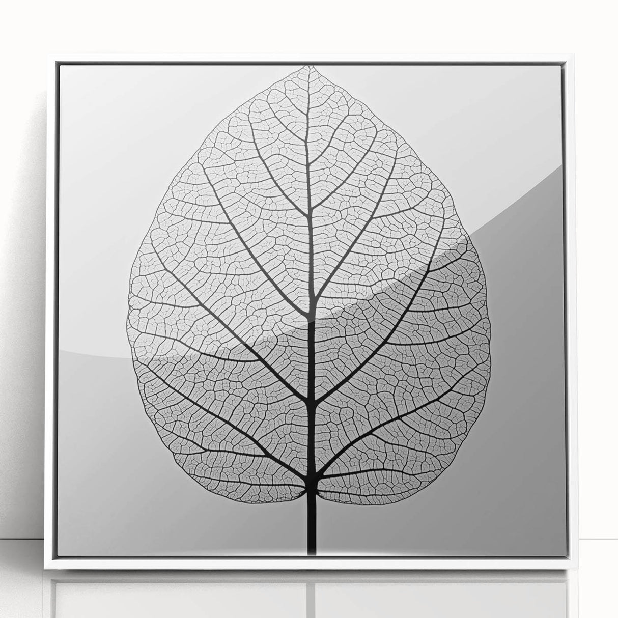 Close-up of green leaves in a white framed acrylic, modern art wall decor, suitable for nursery settings.