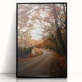 Large abstract wall art depicting autumnal trees in orange and red tones on a black acrylic framed print.