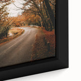 Close-up of extra large black wall art featuring a textured, colorful abstract design on framed canvas.