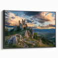 Framed canvas artwork showcasing a stunning landscape with a medieval castle, set against a vibrant sky. The black frame enhances the artwork's elegance, perfect for home decor.