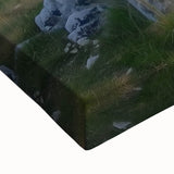 Close-up of a stretched canvas print showcasing a vibrant landscape with a medieval castle, featuring rich colors and intricate details, perfect for home decor.