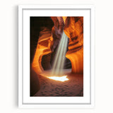 Framed landscape artwork depicting a serene cave scene, featuring a white mat and a sleek black frame, perfect for modern home decor. Ideal for nature enthusiasts.