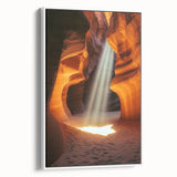 Framed canvas art depicting a serene landscape with caves, featuring natural earthy tones and a white frame, ideal for enhancing home decor and creating a calming atmosphere.
