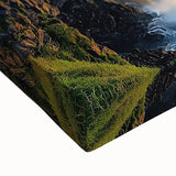 Close-up of a vibrant landscape canvas featuring rugged cliffs and a textured finish, ideal for home decor, showcasing natural beauty in rich colors.