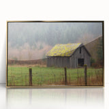 Framed acrylic artwork depicting a serene landscape with a rustic barn, set against a vibrant sunset, ideal for home decor or art enthusiasts.