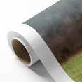 Rolled canvas showcasing a vibrant landscape barn design, featuring rich colors and intricate details, securely packaged in a protective cardboard tube for safe delivery.