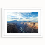 Landscape artwork showcasing vibrant canyons framed in a sleek white mat, highlighting the intricate details and colors of nature. Ideal for home decor.