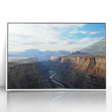 Framed acrylic landscape artwork showcasing vibrant canyons in warm hues, featuring a sleek white frame, perfect for modern home decor. Ideal for art enthusiasts seeking nature-inspired decor.