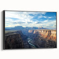 Framed landscape canvas displaying a stunning canyon view with rich earthy tones and a sleek black frame, perfect for modern home decor. Ideal for nature enthusiasts and art collectors.