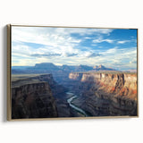 Framed canvas artwork showcasing a stunning landscape of colorful canyons with gold accents, ideal for home decor or office spaces, enhancing aesthetic appeal.