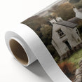 Landscape countryside wall art on rolled canvas, showcasing vibrant green fields and a serene sky, elegantly packaged in a protective cardboard tube for display.
