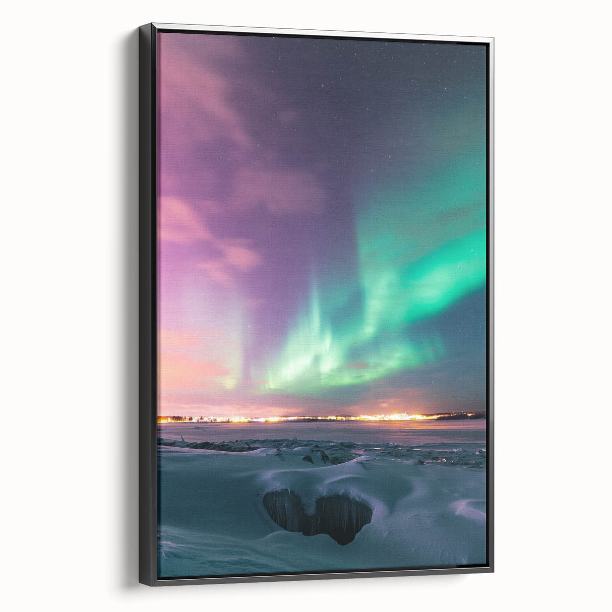 Framed canvas artwork depicting a serene countryside landscape with vibrant greenery and rolling hills, finished with a sleek black frame, ideal for home decor.