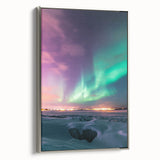 Framed canvas depicting a serene countryside landscape with vibrant greenery and rolling hills, complemented by a sleek silver frame, ideal for home décor.