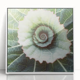 Close-up of green leaves in art deco style, acrylic print in white frame, suitable for modern nursery decor.