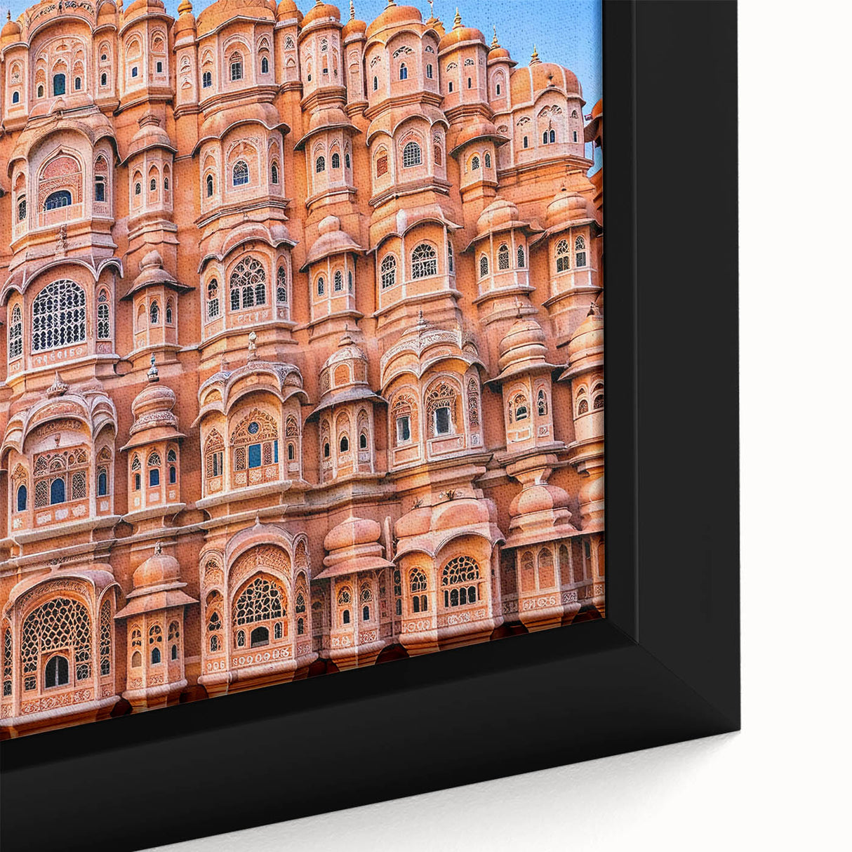 Extra large framed canvas featuring a textured depiction of an Indian scenery in black with colorful accents.