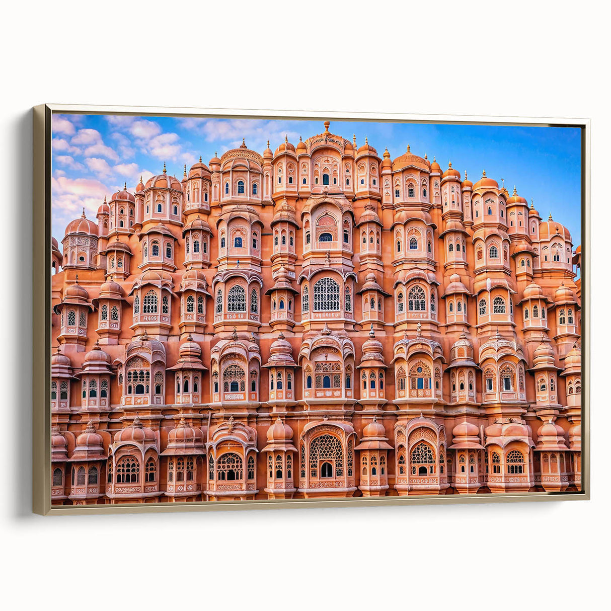 Framed canvas depicting a vintage-style Indian landscape in gold and black tones, ideal for bedroom wall decor.