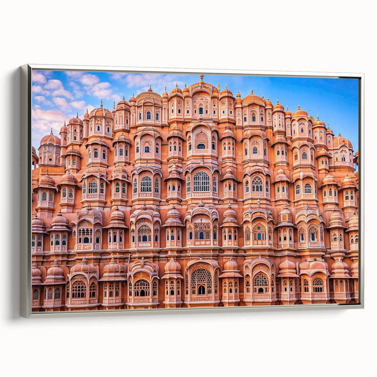 Landscape art painting of a scenic Indian countryside on a framed canvas, featuring vibrant green and blue tones.